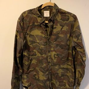 Camo shirt.
